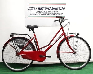 La classica bici da donna Sergio Bianchi, adatta per uso quotidiano, completa di luce a led, portacestino e portapacchi