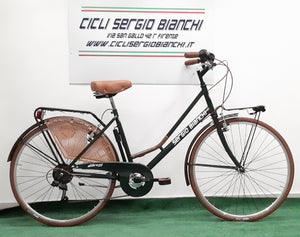 Classica bicicletta da donna con rifiniture vintage e cambio posteriore 6 velocità .