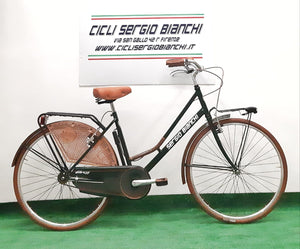 Bicicletta da donna vintage con freni v-brake in alluminio e rifiniture marroni .